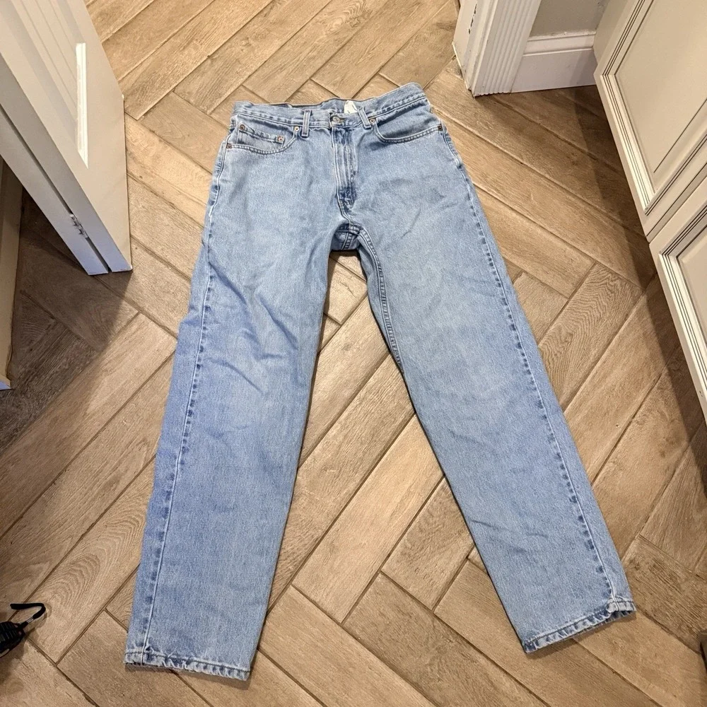 Vintage Levi's 550 Relaxed Light Wash Denim Jeans 34x32 Mexico Perfectly Worn